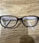 Ralph Lauren Eyeglasses RA7020 1018 52-16-135 Brown Purple Cat Frame Pre-owned. Price: $15.08.