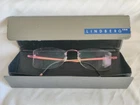 Lindberg Spirit Titanium Rimless Eyeglasses Col P70 Pink Tone Pre-owned. Price: $159.00.