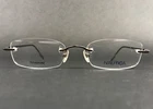 Nautica Eyeglasses Frames N7811 006 Titanium Brown Rimless Rectangle 51-19-140 New. Price: $92.15.