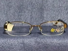 Oleg Cassini OCO341 200 Dark Brown Womens Rectangle Eyeglasses 50-20-135 New. Price: $23.95.