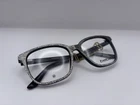 Bebe BB5217 001 Jet Glitter Eyeglass Frames Black 52-17-140 New. Price: $50.99.