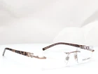 Dolce & Gabbana Dg 1184 390 Rimless Copper Women's Eyeglasses Frames 51-16-130 New. Price: $149.95.