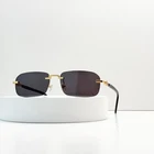 Gucci GG1221S 001 Rimless Sunglasses Gold Black Gray Lens 56-16-140 New. Price: $148.00.