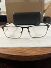 Tlg Men's Titanium Eyeglasses Frame NU043 C02 59-18-145 New. Price: $70.00.