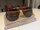 New Burberry 3125 Oliver Sunglasses 101773 Gold 100% Authentic Pre-owned. Price: $180.00.