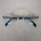 Charmant XL2082 WP1 Line Art Silver/teal Rimless Japan 52-17-135 Pre-owned. Price: $29.99.