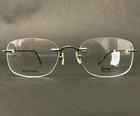 Technolite Eyeglasses Frames Tld 505 Gm Gunmetal Gray Square Rimless 52-19-140 New. Price: $58.19.