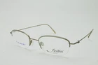 Vintage Marchon Flexon Flexibles 5107 Taupe Eyeglasses SIZE:52-21-140 New. Price: $149.00.