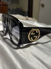 Gucci GG0152S Sunglasses 002 Black / Acetate 57MM Pre-owned. Price: $250.00.