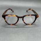 Zenni 4415325 Kid's Round Eyeglasses Frame Tortoise 45-19-140 Used W./ Case Pre-owned. Price: $14.95.