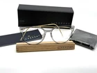 Lindberg N.o.w. Eyeglasses Frame 6634 C07 Transparent Grey T804 Gold Temples New. Price: $500.00.