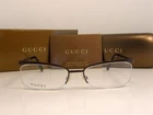 Gucci Eyeglasses Model 2886 Color Gji Dark Brown Metal Frame New. Price: $139.95.