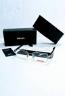 Prada Linea Rossa Men's Silver Black Semi Rimless Eyeglasses VPS51S 54-18 New. Price: $169.00.