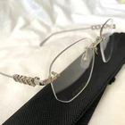 Gucci Glasses Frame GG1806O Silver Rimless (non-prescription) Pre-owned. Price: $255.43.