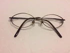 Miracle Clip Eyeglass MC070 51*17*140 Ant,brown U.S.PAT.#6.343.858 Only Frame Pre-owned. Price: $15.00.