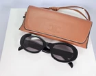 Celine CL40194U 01A 52MM Round Black Sunglasses With Grey Lens New. Price: $235.00.