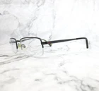 Nike Eyeglasses 8095 001 Gray Metal Half Rim Frame 52-18 140 Pre-owned. Price: $37.43.