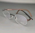 Ovvo 3992 Raisin Hypoallergenic Half Rim Titanium Eyeglass Frame 47/22/140 New. Price: $219.95.