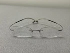 Silhouette Eyeglasses 7581 6051 Icon Vanilla Brown Rimless 19 Titan Pre-owned. Price: $89.87.