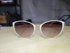 Carolina Herrera Cat Eye SHE087 White, Pink And Gold Glasses Pre-owned. Price: $39.99.