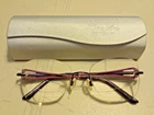 Charmant Eyeglasses CH10952 Vo Violet Pure Titanium Rimless Frame 18 135 Pre-owned. Price: $35.99.