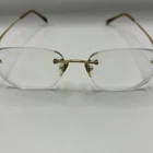 Ray Ban Rb 8503 Titanium 1001 Gold Tone Rimless Eyeglasses Frames 51-17-140 Pre-owned. Price: $49.99.