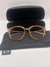 Oakley OX8150-0553 53/17 141 Polished Transparent Ginger Oval Eyeglasses New. Price: $107.49.