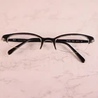 Ray Ban RB7005 2034 Black Half Rim Eyeglasses Frame 48-19 135 Pre-owned. Price: $18.73.