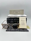 Eyevan 7285 Polarized Sunglasses 743 3231 Brown Silver Titanium 48 145 New. Price: $349.99.