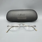 Silhouette 7534 6085 Titanium Rimless Eyeglasses 19 145 Frames Only + Case Pre-owned. Price: $59.97.