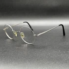 Zenni 550011 Round Eyeglasses Frame Silver Flex 43-26-140 Euc Pre-owned. Price: $14.00.