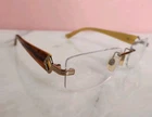 Luxottica LU2276-B Rimless Glasses Frames Only 53-17-135 Tortoise Y2K Pre-owned. Price: $32.50.