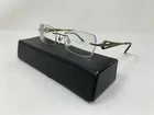 Charmant Eyeglasses CH10952 Br Titanium Frame Rimless 18 135 Pre-owned. Price: $100.00.