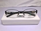 Lacoste Eyeglasses Frames LA12230 50-19-130 Black Half Rim And Case Pre-owned. Price: $59.99.