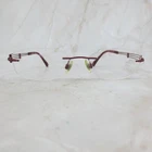 Charmant Line Art Eyeglasses Frame XL2002 Women's Burgundy Rimless 51-18-135 Pre-owned. Price: $89.99.