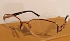 New Sophia Loren Eyeglass Frames M231 Cognac 51-19-135 Zyloware Women's Half Rim. Price: $64.99.