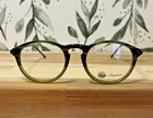 Anglo American Eyeglasses.model P Lux. Handmade England. 49-20.ROUND Green Ombre New. Price: $93.00.