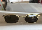 Vintage Eyeworks Sunglasses Akio 444 Antique Brown Frames With Lenses New. Price: $28.00.