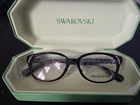 Swarovski SK2040D Glasses, Black Frame With Strass Crystal Embellishments 1001 New. Price: $37.99.