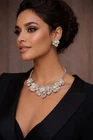 Vintage Kenneth Jay Lane Rhodium-platedfloral Crystal Set New. Price: $580.00.