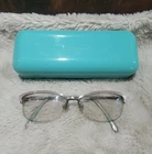Tiffany & Co TF1102 6001 Silver Pink Bow Eyeglass Frames 55 16 140 Italy W/case Pre-owned. Price: $149.00.