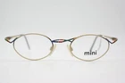 Vintage Glasses Art Design Mini 735 Gold Multicolored Oval Eyeglass Frame New. Price: $83.36.