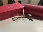 Cartier CT0066O Rimless Rectangular Gold Metal Eyeglass Frames 55-19-140 New. Price: $150.00.