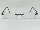 Marchon AIRLOCK2 Eyeglasses Frame 770/37 014 Bronze Rimless 52 21 140 Pre-owned. Price: $49.00.