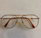 Charmant Titanium Eyeglasses Gold Metal Frame 56-15 140MM Vintage Pre-owned. Price: $34.99.