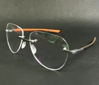 Mclaren Eyeglasses Frames MS-85O04 C03 Ruthenium Orange Rimless 56-17-145 New. Price: $179.99.