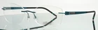 Silhouette 4418 6065 5369 Teal Black Womens Rimless Eyeglasses 54-17-140 New. Price: $134.99.