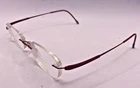 Silhouette Frames Only Titanium Rimless Eyeglasses 7715 40 6057 Red 48-19-135 Pre-owned. Price: $58.88.