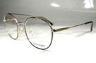 Calvin Klein CK18123 200 Eyeglasses Frame Matte Gold, Size: 50-19-140 New. Price: $109.95.