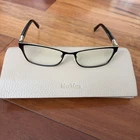 Eyeglass Frames. Black And Gold In Color. MM1237 D16 135. Pre-owned. Price: $24.99.
